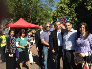 United with Israel staff members, standing outside the Frankel home, were among thousands who visited grieving families of murdered teens. (Photo: UWI)