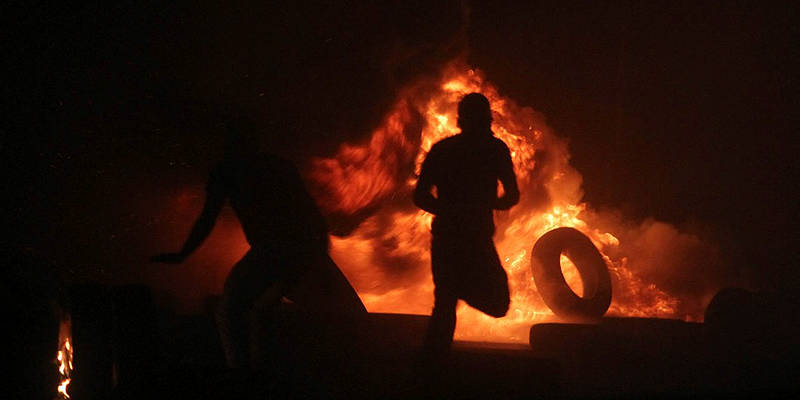 tires burned by Arabs during riots