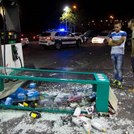 A gas station heavily damaged by Arab rioters