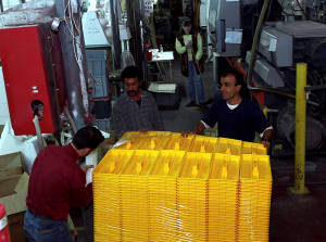 Palestinian employees working at an Israeli factory in Barkan, Samaria. (Photo: Flash90)