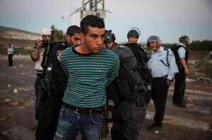 Police make arrests of youth throwing rocks and Molotov cocktails on Saturday at entrance to northern Arab village. (Photo: Hadas Parush/Flash90)