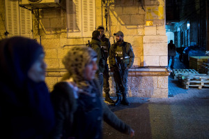 Police at the scene where a Jewish man was stabbed by an Arab terrorist on Nov. 16, 2014. (Photo: Yonatan Sindel/Flash90)