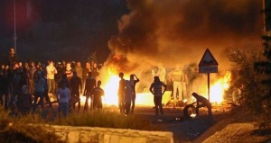 Arabs riot and throw rocks at Israeli Border Policemen at the entrance to the Arab village of Kafr Kana in northern Israel on November 9, 2014. (Photo: Flash90)