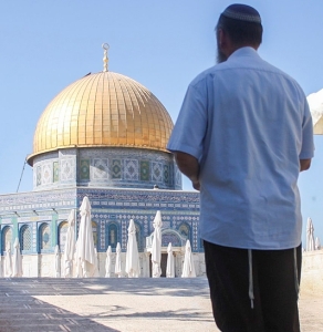 A Jew stands on the Temple Mount.