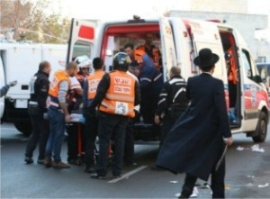 Medical teams at the scene of the terror attack. (Hillel Maeir/Tazpit News Agency) 