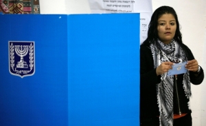 An Arab Israeli woman casts her vote during the 2009 elections. (Photo: Nati Shohat / Flash90)