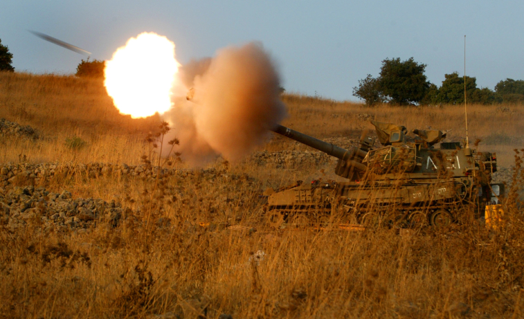 An Israeli mobile artillery piece fires a shell. (Olivier Fitoussi/Flash 90) An Israeli mobile artillery piece fires a shell. (Olivier Fitoussi/Flash 90)