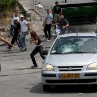 Stone car attack