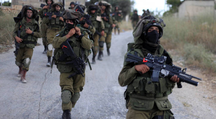 IDF soldiers patrol in Judea and Samaria. (Photo by Issam Rimawi/Flash 90)