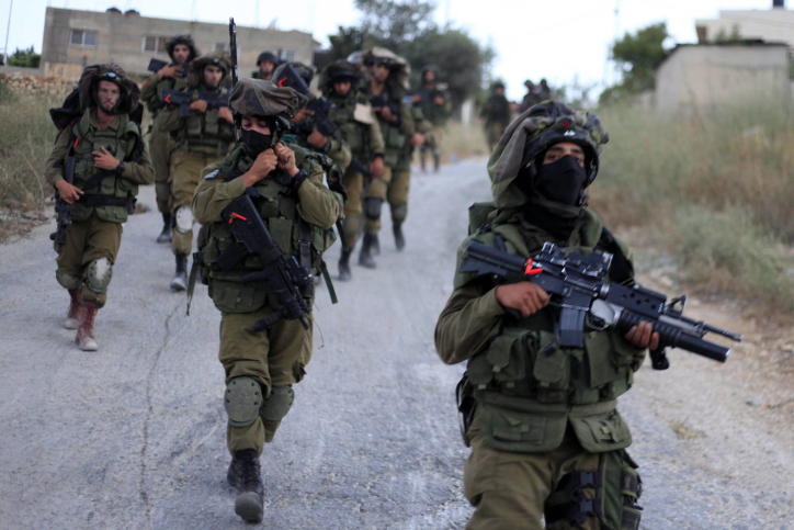 IDF soldiers patrol in Judea and Samaria. (Photo by Issam Rimawi/Flash 90)