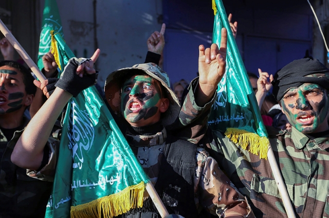 Hamas terrorists on the march in Gaza