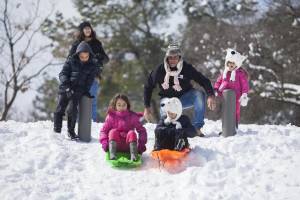 Kids sliding in Jerusalem's Independence Park. (Yonatan Sindel/Flash90)