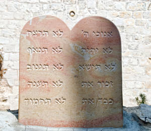 Marble with abbreviated phrases alluding to the Ten commandments. (Yuriy Chertok/Shutterstock)