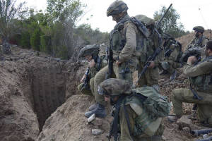 IDF forces view an exposed terror tunnel