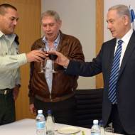 Israeli prime minister Benjamin Netanyahu (R) seen with Tamir Pardo (C), director of the Mossad, and Military Secretary Eyal Zamir