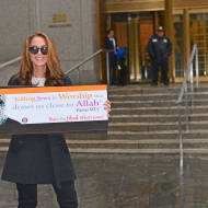 Pamela Geller holds the anti-Hamas ad.