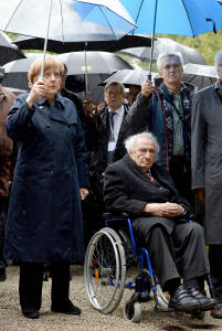 German Chancellor Angela Merkel, left, and camp survivor Max Mannheimer lay a wreath at Dachau. (Andreas Gebert/Pool Photo via AP)