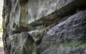 A close-up look reveals Hebrew letters etched in the stone.