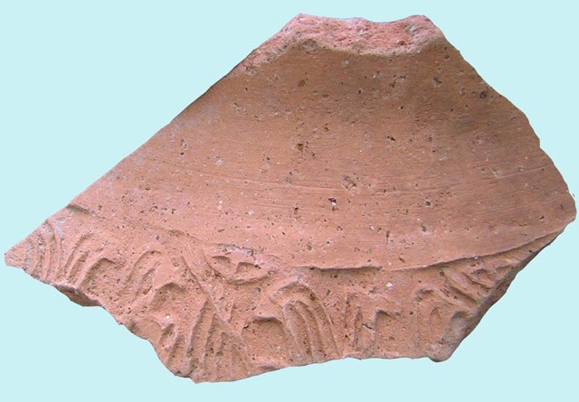 Fragment of cylinder seal impression found at Bet Ha-'Emeq site