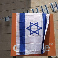 Israeli employees cover Orange logos