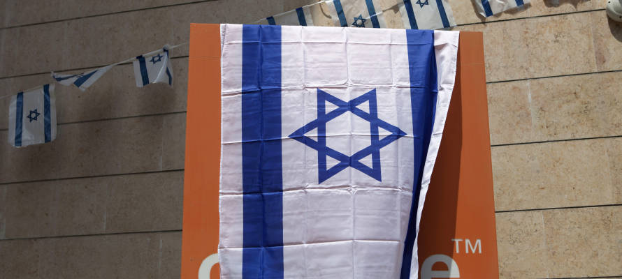 Israeli employees cover Orange logos