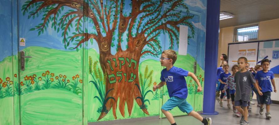 Children participate in an emergency drill.