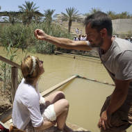 Christian baptisms on both sides of the Jordan River