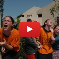 Jewish settlers cry as a soldier forces them to evacuate their home in the Jewish settlement of Neve Dekalim. Photo by Flash90