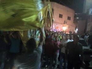 Palestinians celebrate murder