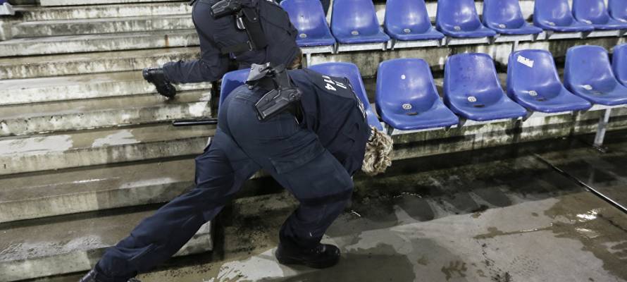 Security check after evacuation of Hanover soccer stadium due to Islamic terror threats. (AP/Markus Schreiber)