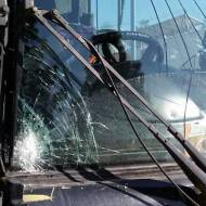 Shattered window of Breaking the Silence tour bus