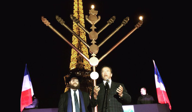 Arnold Schwartzenegger Lights Chanukah Menorah in Paris