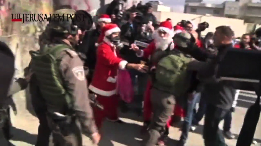 Palestinian Protesters Dress Like Santa Claus and Antagonize the IDF