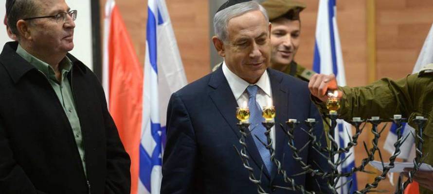 Prime Minister Netanyahu Lights the Rockets into Roses United with Israel Menorah