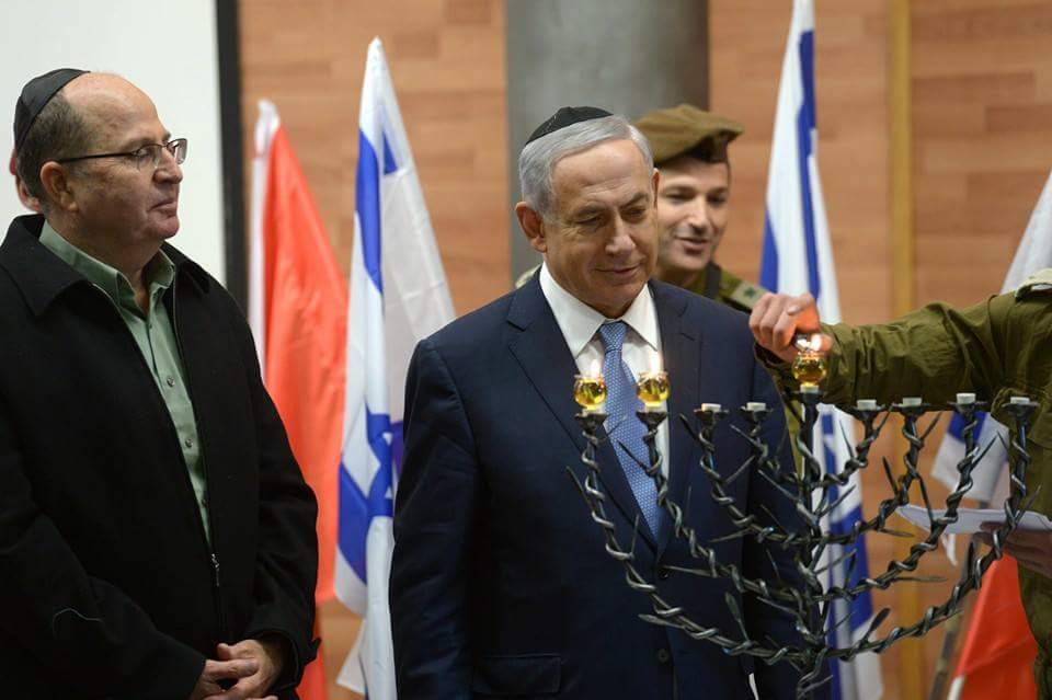 Prime Minister Netanyahu Lights the Rockets into Roses United with Israel Menorah