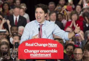 Canadian PM Justin Trudeau waves to supporters in Ottawa ahead his landslide victory in the October election. (The Canadian Press via AP)
