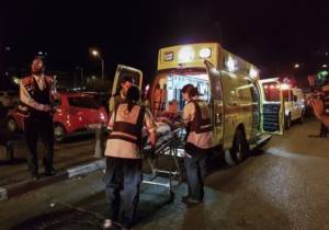 Medics evacuate a victim from the scene of the Tel Aviv shooting attack on Wednesday. (Moti Karelitz/Flash90)