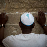 Praying at Western Wall