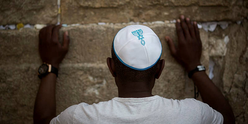 Praying at Western Wall