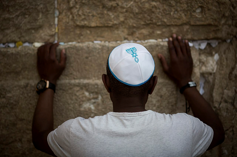 Praying at Western Wall