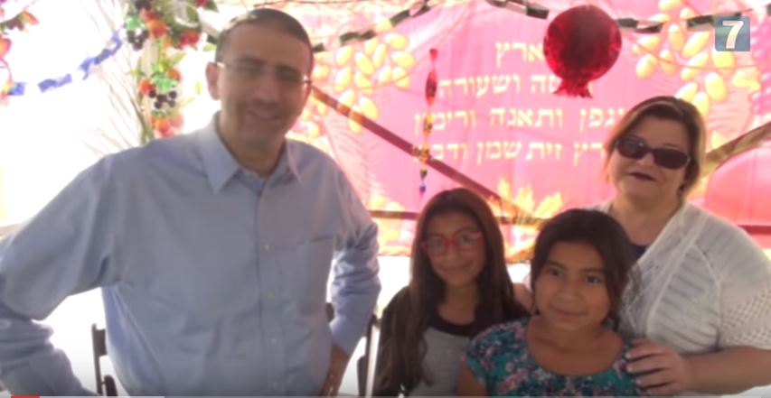 Dan Shapiro in his Sukkah