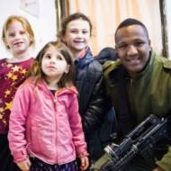 bedouin-soldier-with-children-at-uwi-chanukah-party