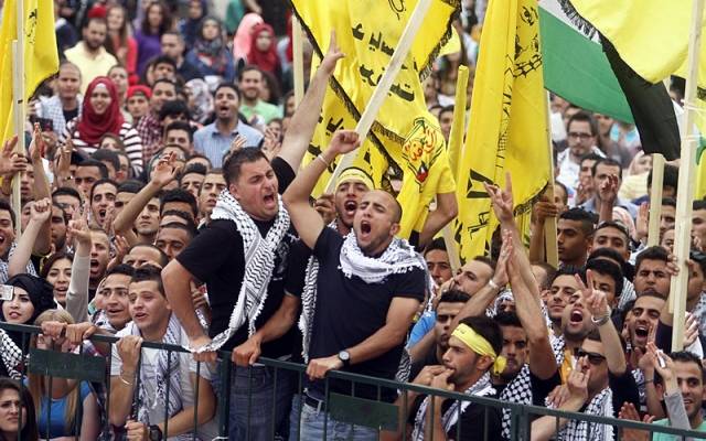 Palestinian student supporters of Fatah. (Issam Rimawi/Flash90)