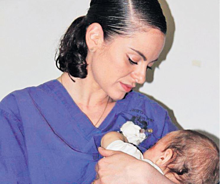 Jewish nurse feeds palestinian baby