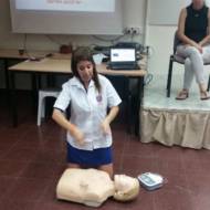 Nechama Loebel teaching an EMS course in sign language.