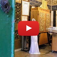 Jewish bride praying at Cave of the Patriarchs before her wedding, 2010