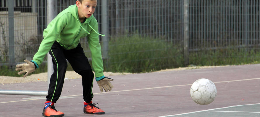Israeli child plays football