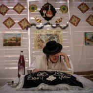 Man in sukkah