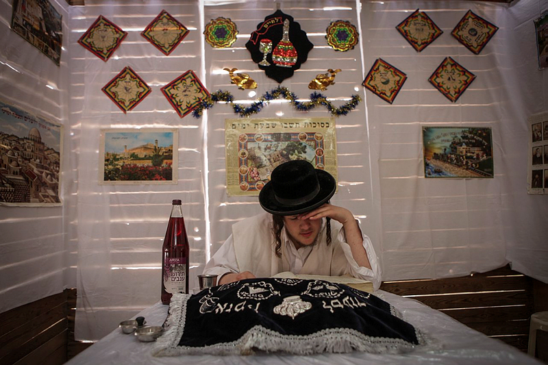 Man in sukkah