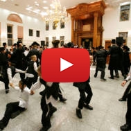 Men and boys dancing on Sukkot
